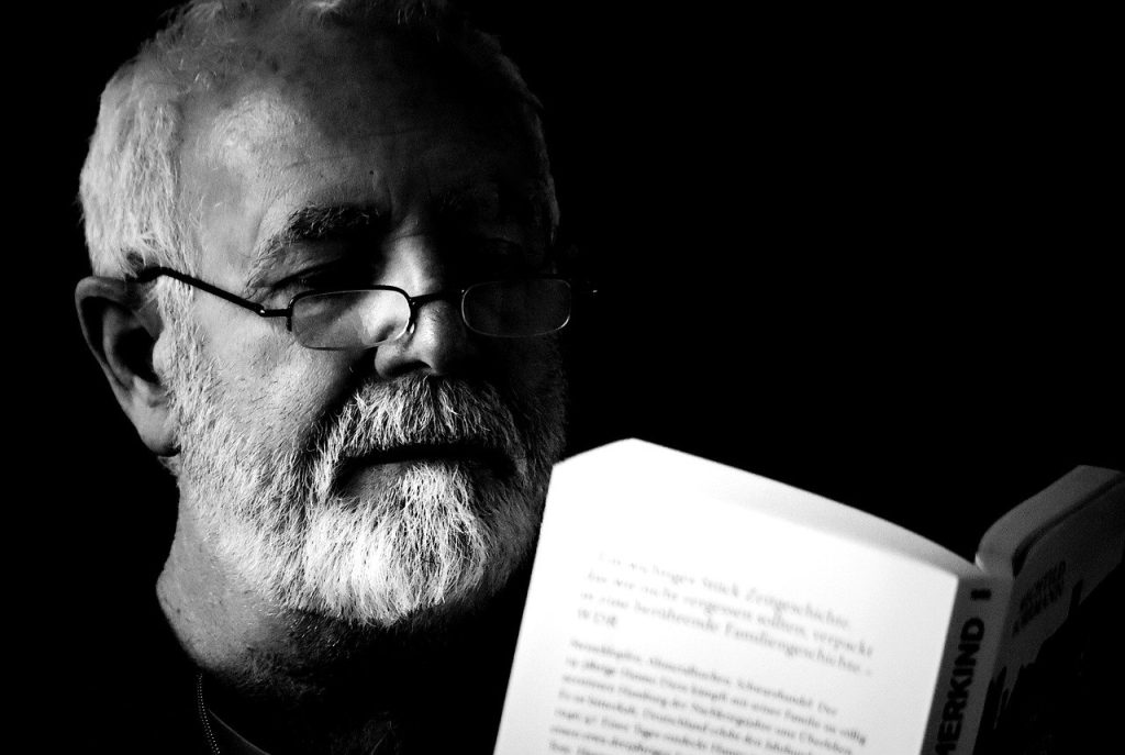 man, a book, read