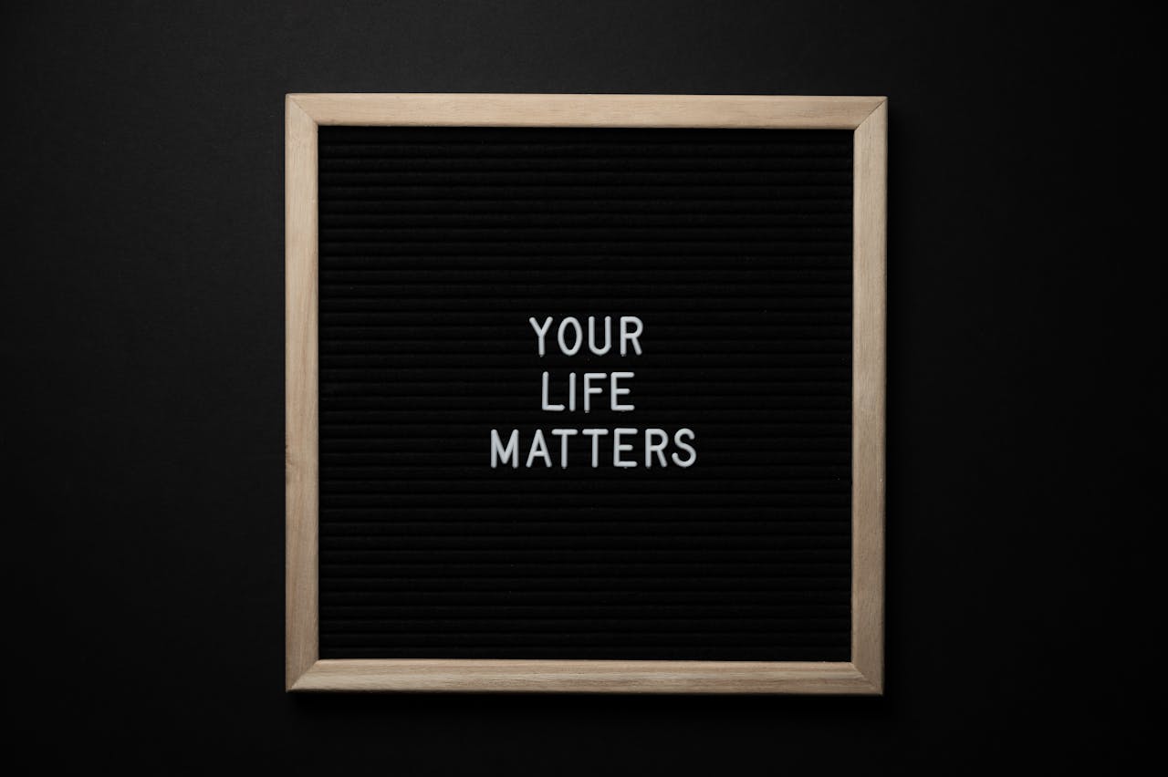 A chalkboard with the motivational message 'Your Life Matters' in white letters.